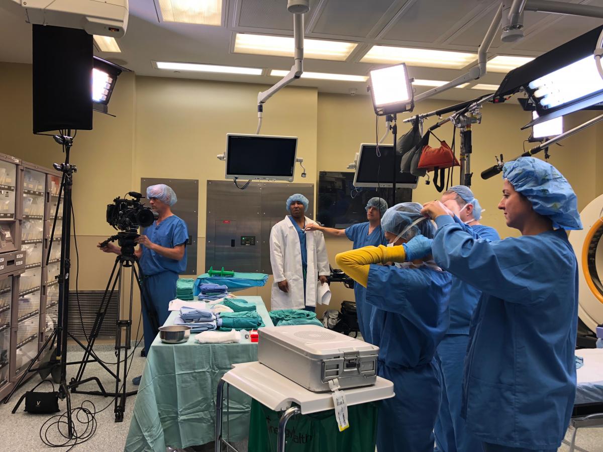 The team filming a training video at the Duke Raleigh operating room